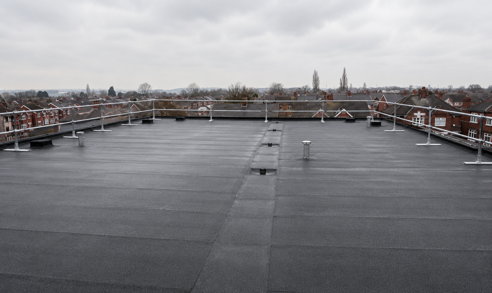 Roofing work in progress by the Sky Roofing Systems team